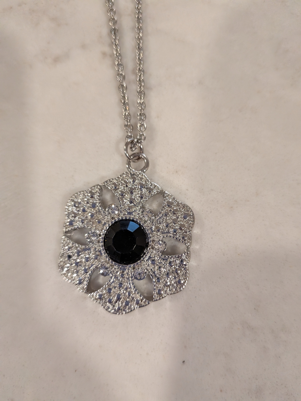 Silver Floral Pendant Necklace with Black Centerstone